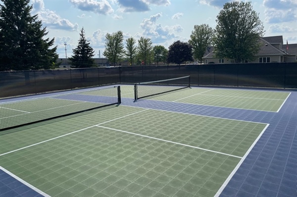 Protecting Your Property: Netting, Fencing, and Rebounder Options for Your Backyard Court